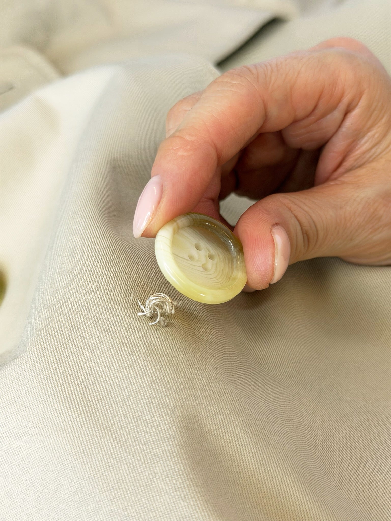 Button Reattachment